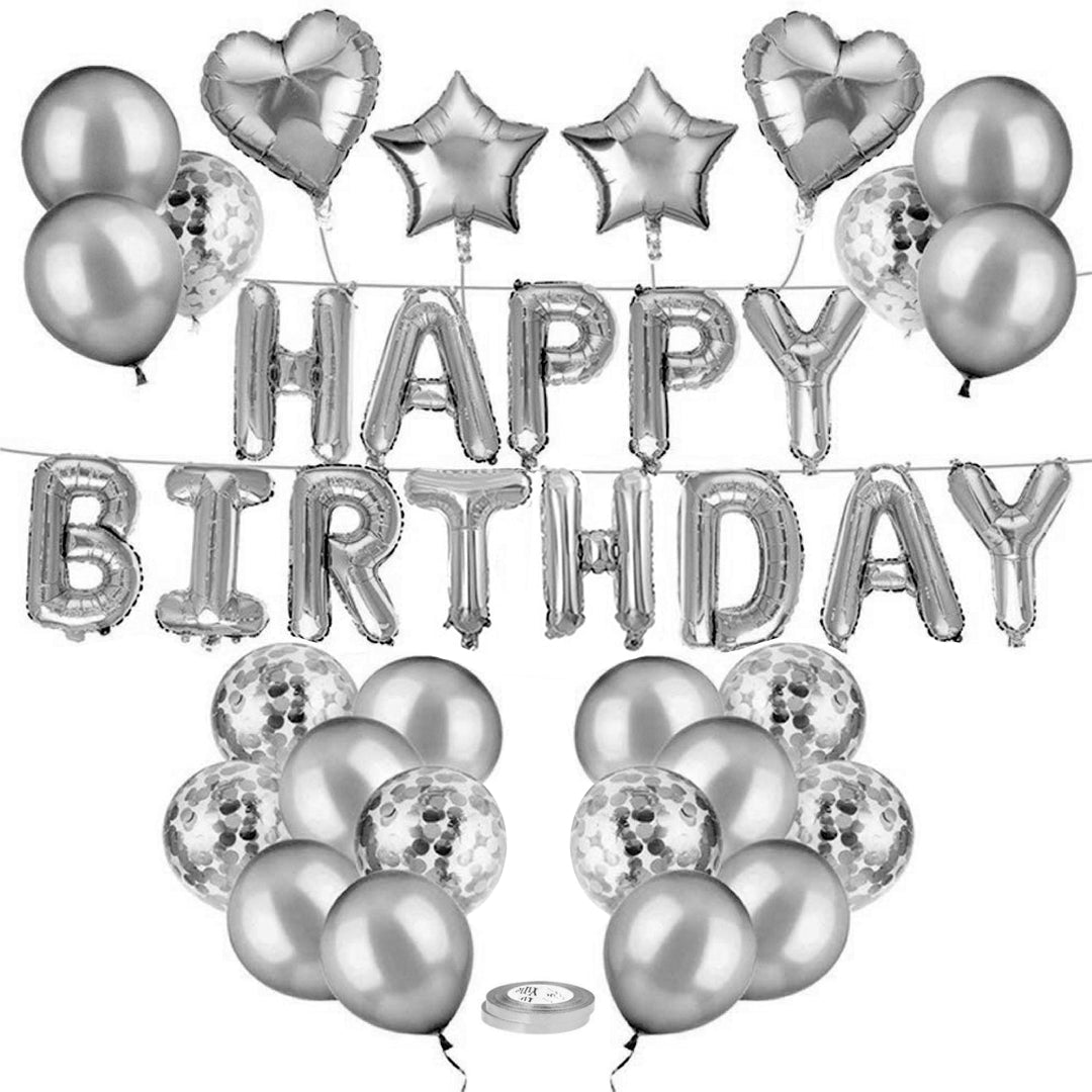 Silverfärgade ballonger och folieballonger som bildar texten Happy Birthday