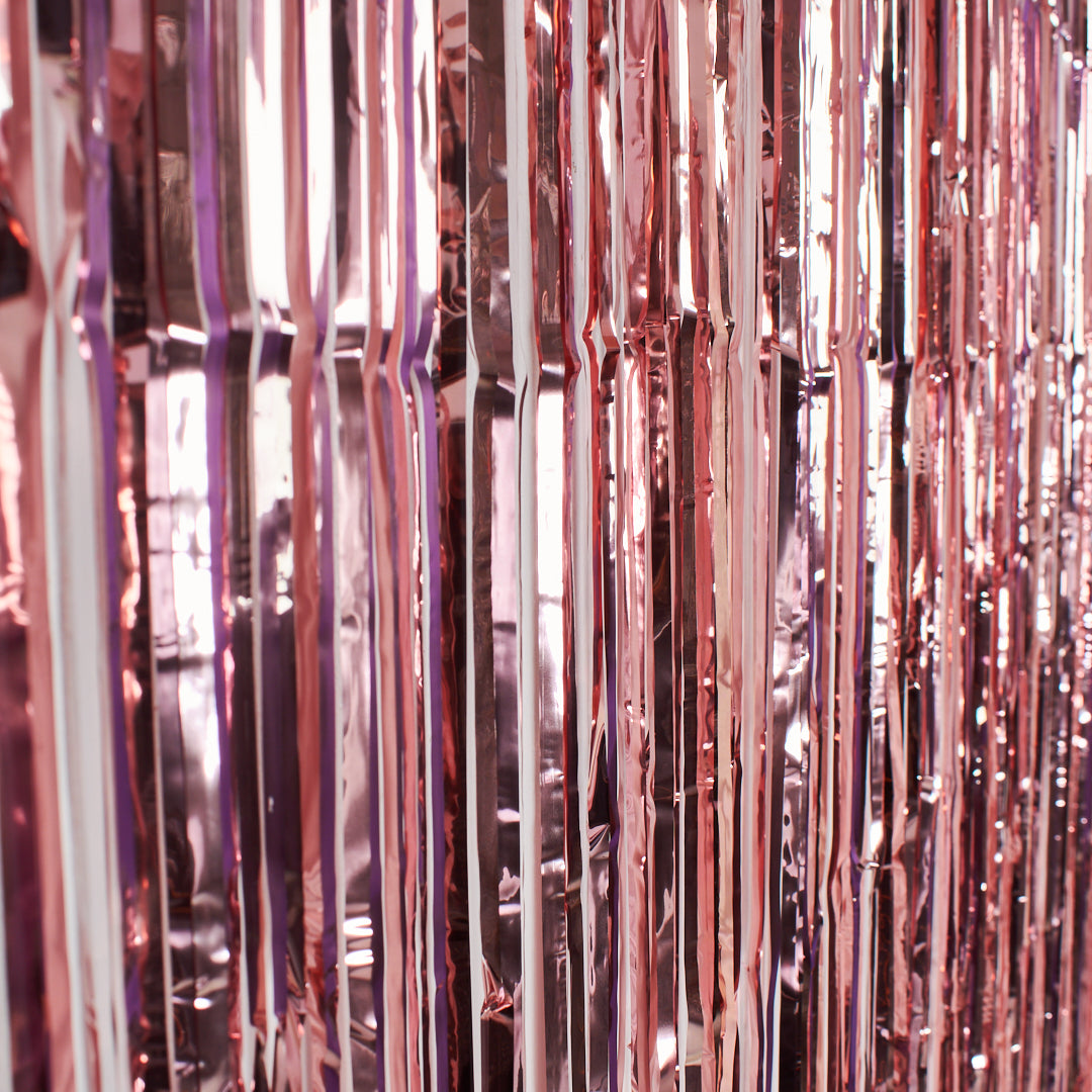 Roséguldfärgad glittergardin som fotobakgrund